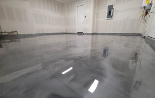 This image shows a commercial space with epoxy painted floor.